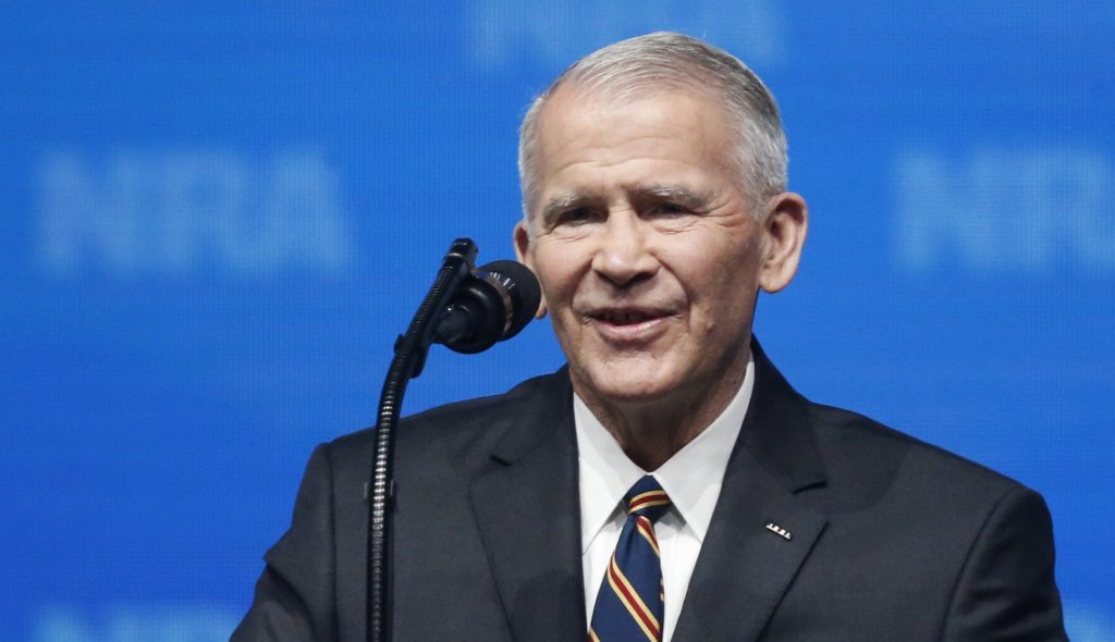In this May 4, 2018 photo, former U.S. Marine Lt. Col. Oliver North speaks before giving the Invocation at the National Rifle Association-Institute for Legislative Action Leadership Forum in Dallas. The NRA announced today that North will become President of the National Rifle Association of America within a few weeks, a process the NRA Board of Directors initiated this morning. (AP Photo/Sue Ogrocki)