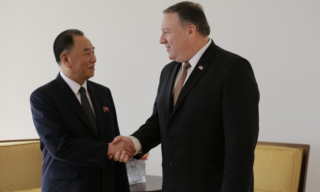 Kim Yong Chol, left, former North Korean military intelligence chief and one of leader Kim Jong Un's closest aides, shakes hands with U.S. Secretary of State Mike Pompeo during a meeting, Thursday, May 31, 2018, in New York. (AP Photo/Seth Wenig)