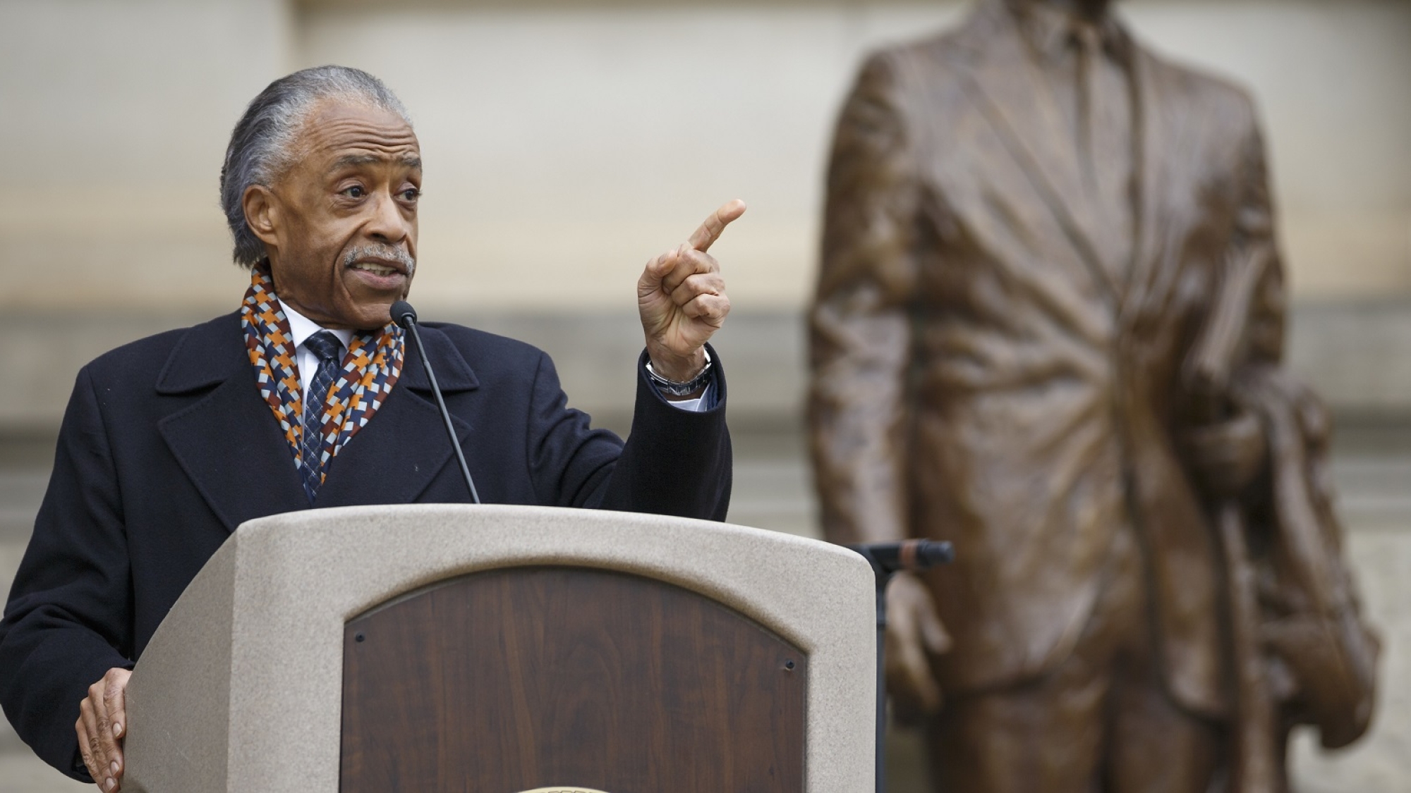 Reverend Al Sharpton addresses the crowd at the capital during the March for Humanity marking the 50th anniversary of Rev. Martin Luther King Jr.'s assassination which commenced at Ebenezer Baptist Church and concluded at the state capital, Monday, Apr. 9, 2018, in Atlanta. (AP Photo/Todd Kirkland)