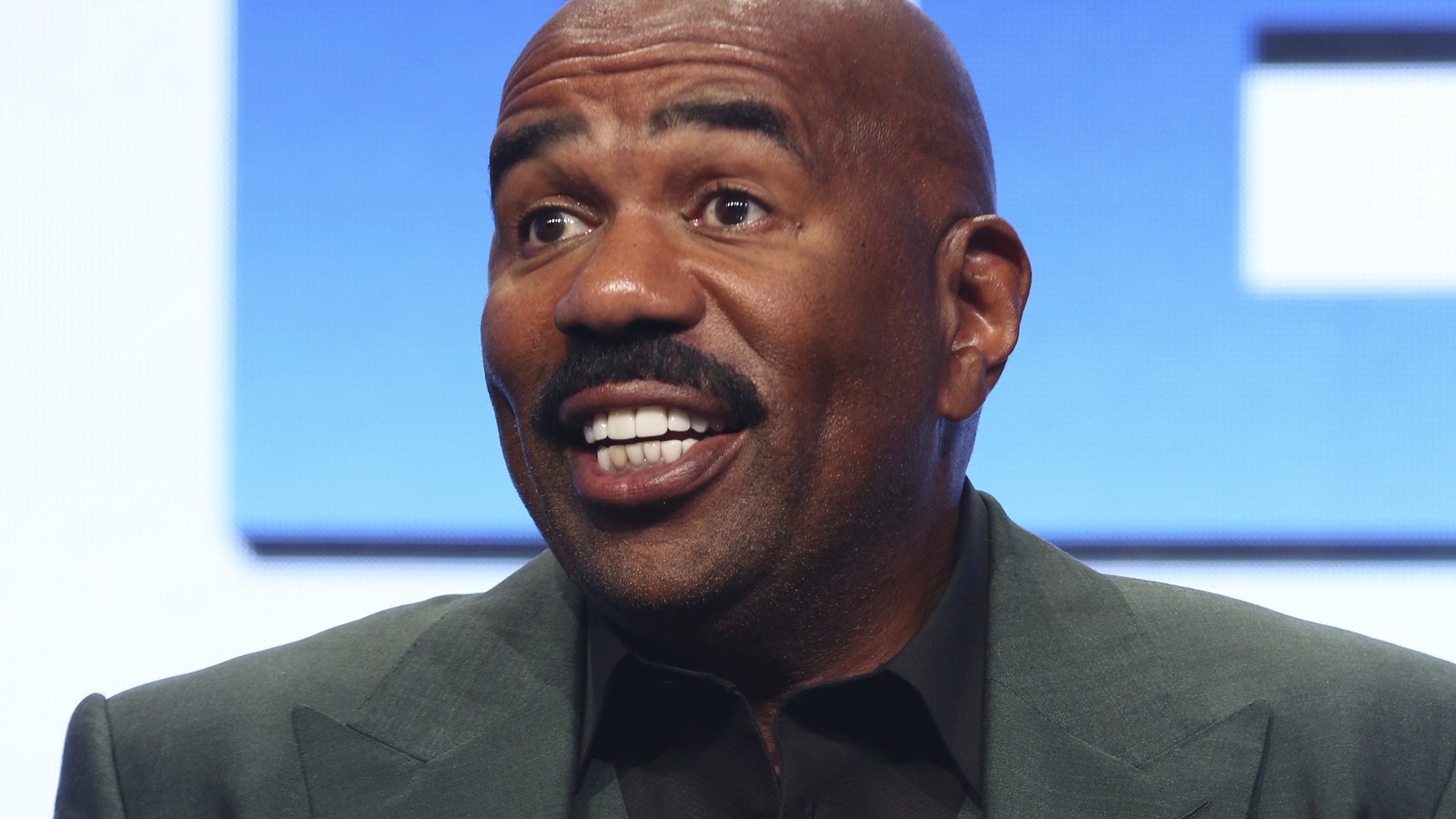 FILE - In this Aug. 3, 2017 file photo, host/executive producer Steve Harvey participates in the "Steve" panel during the NBC Television Critics Association Summer Press Tour in Beverly Hills, Calif. Harvey  will be stationed in Times Square for "Fox's New Year's Eve with Steve Harvey." It will air Sunday, Dec. 31, from 8 to 10 p.m. and from 11 p.m. to 12:30 a.m. (Photo by Willy Sanjuan/Invision/AP, File)