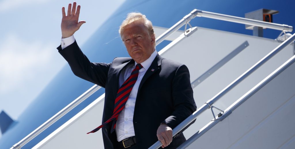 President Donald Trump steps off Air Force One as he arrives for the G7 Summit, Friday, June 8, 2018, in Canadian Forces Base Bagotville, Canada. (AP Photo/Evan Vucci)