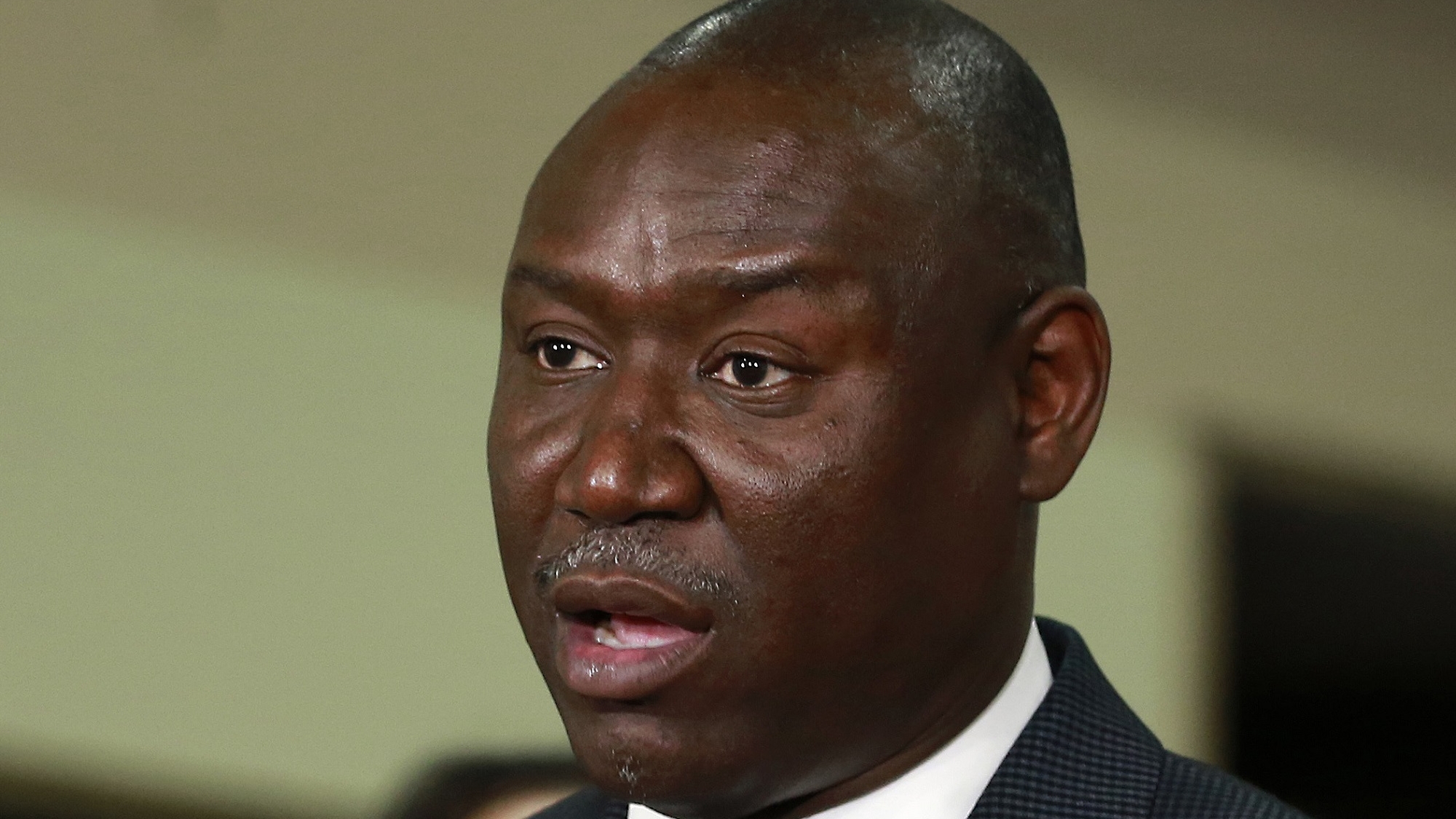 Attorney Benjamin Crump, who represents the family of police shooting victim Stephon Clark, discusses the findings of an independent autopsy during a news conference, Friday, March 30, 2018, in Sacramento, Calif. Over the years, Crump has represented the relatives of other unarmed black men fatally shot by police in other parts of the country. (AP Photo/Rich Pedroncelli)