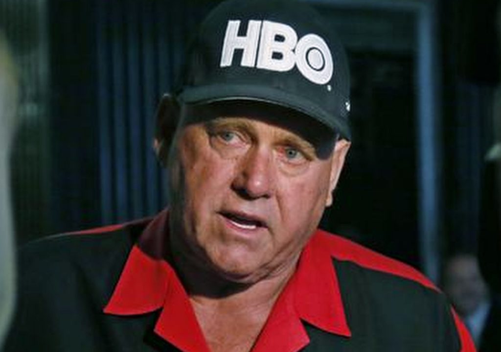 FILE - In this June 13, 2016, file photo, Dennis Hof, owner of the Moonlite BunnyRanch, a legal brothel near Carson City, Nevada, is pictured during an interview in Oklahoma City. Hof, Nevada's best-known legal brothel owner is being accused of violating regulations at a property he owns near a desert crossroads outside Las Vegas. Nye County Commission Chairman Dan Schinhofen, says Hof faces possible commission discipline May 17, 2017, on two code violations found at his brothel in Amargosa Valley. (AP Photo/Sue Ogrocki, File)