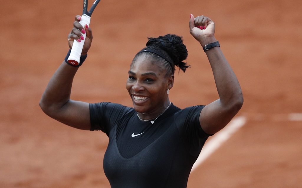 Serena Williams of the U.S. celebrates winning her third round match against Germany's Julia Georges of the French Open tennis tournament at the Roland Garros stadium in Paris, France, Saturday, June 2, 2018. (AP Photo/Christophe Ena )
