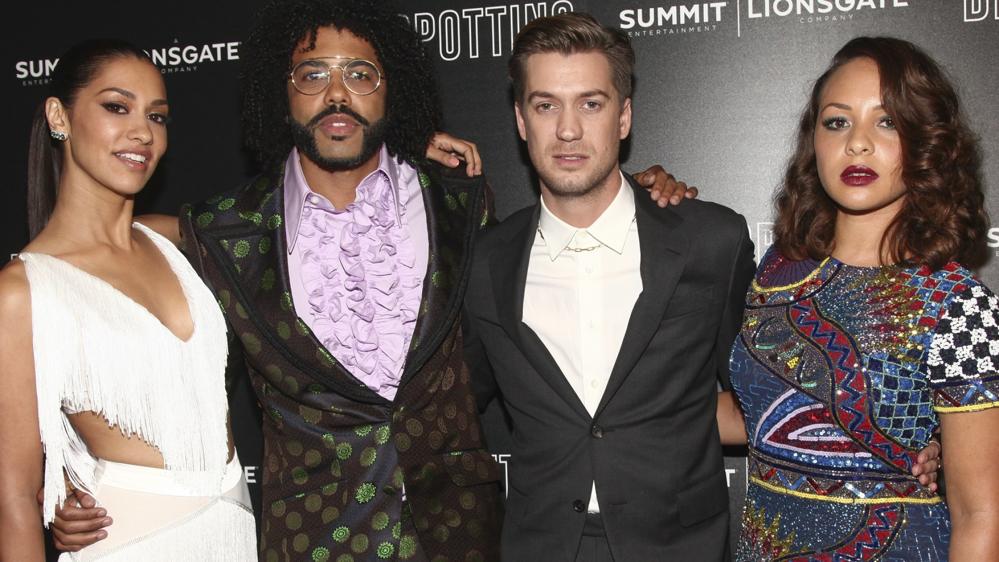 Janina Gavankar, from left, Daveed Diggs, Rafael Casal and Jasmine Cephas Jones attend a special screening of "Blindspotting," hosted by Lionsgate and The Cinema Society, at the Angelika Film Center, Monday, July 16, 2018, in New York. (Photo by Andy Kropa/Invision/AP)
