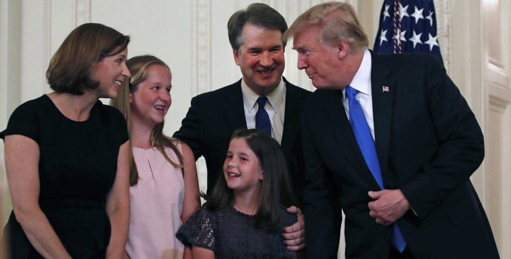 President Donald Trump talks with Judge Brett Kavanaugh his Supreme Court nominee, and his family in the East Room of the White House, Monday, July 9, 2018, in Washington.   (AP Photo/Alex Brandon)