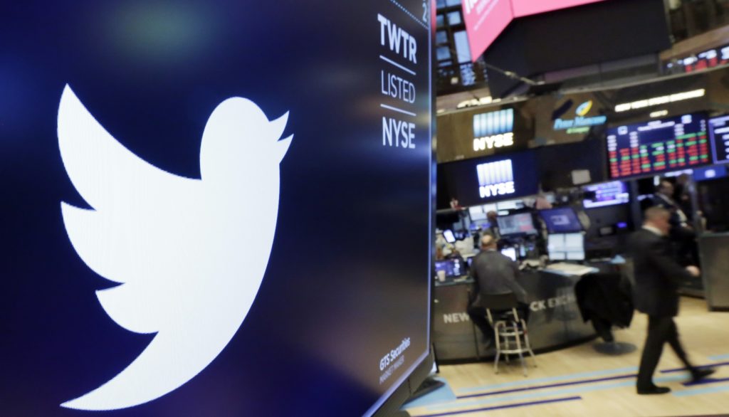 FILE - In this Feb. 8, 2018 file photo, the logo for Twitter is displayed above a trading post on the floor of the New York Stock Exchange. Twitter suspended at least 58 million user accounts in the final three months of 2017, according to data obtained by The Associated Press. The figure highlights the company’s newly aggressive stance against malicious or suspicious accounts in the wake of Russian disinformation efforts during the 2016 U.S. presidential campaign. (AP Photo/Richard Drew, File)