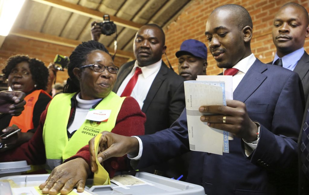 Zimbabwe's main opposition leader Nelson Chamisa casts his vote at a polling station in Harare, Zimbabwe, Monday, July 30, 2018. Zimbabwe votes in an election that could, if deemed credible, tilt the country toward recovery after years of economic collapse and repression under former leader Robert Mugabe. (AP Photo/Tsvangirayi Mukwazhi)