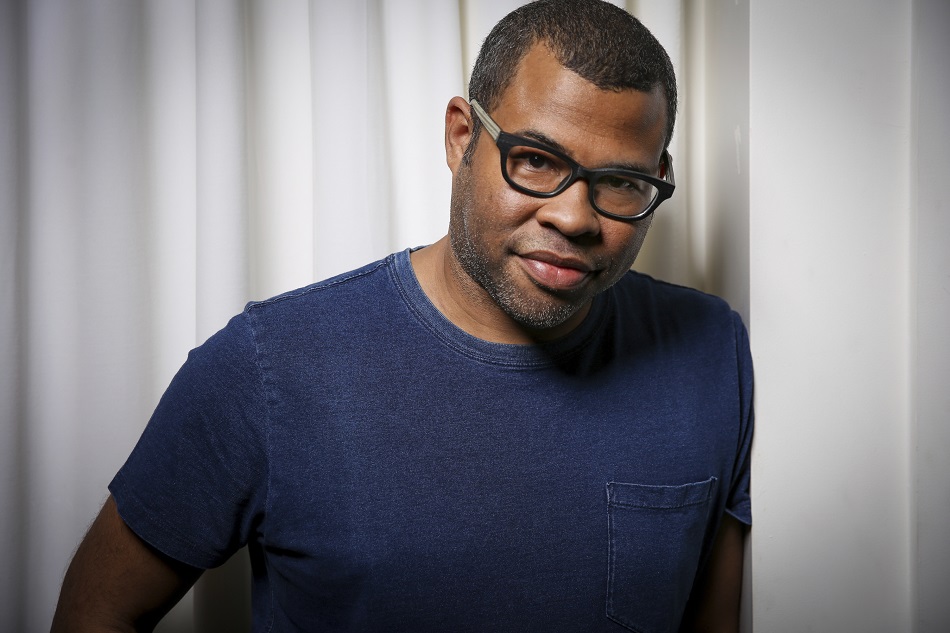 In this Thursday, Feb. 9, 2017 photo, Jordan Peele poses for a portrait at the SLS Hotel in Los Angeles. Peele's directorial debut, "Get Out," in theaters Friday, Feb. 24, is one of those rare creations that functions both as a taut psychological thriller and as searing social commentary about racism in the modern era. (Photo by Rich Fury/Invision/AP)