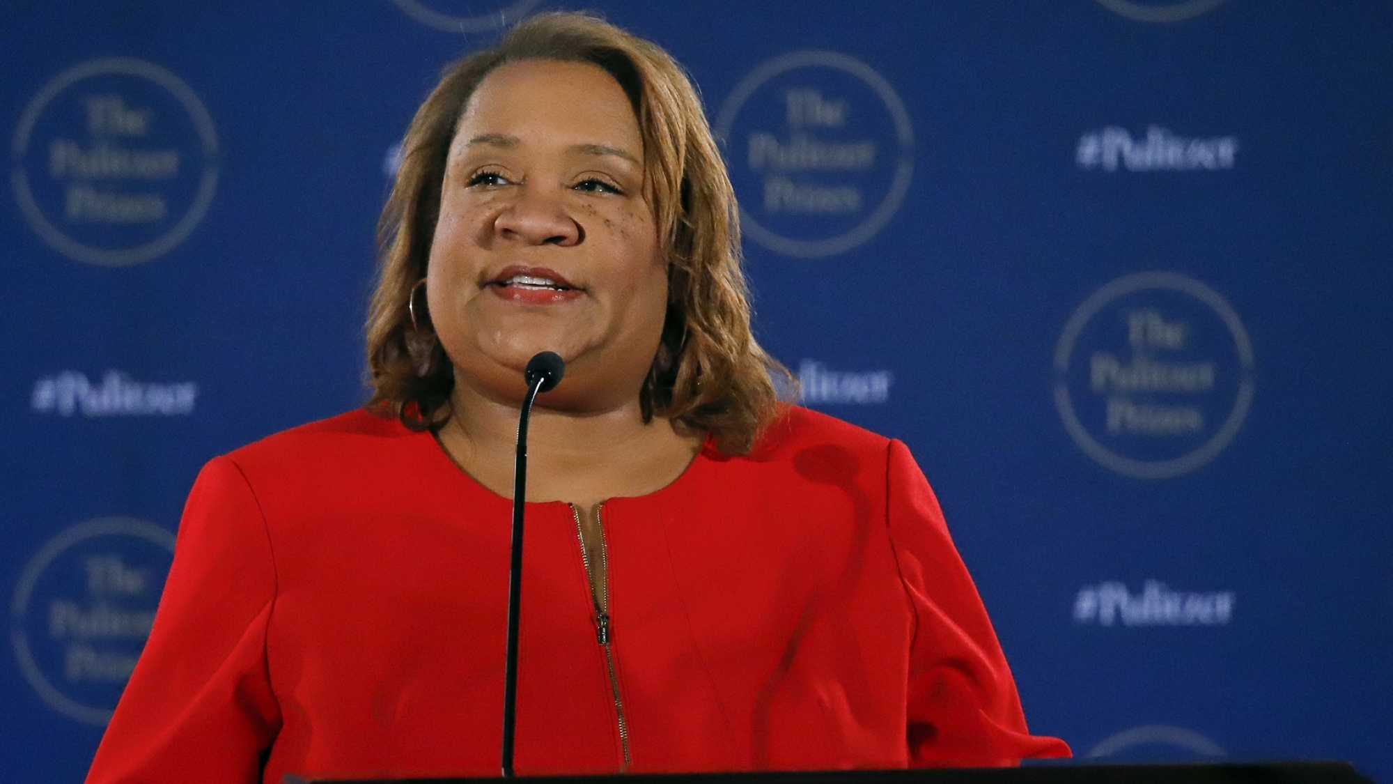 Dana Canedy, the new administrator of The Pulitzer Prizes, announces the 2018 winners, Monday April 16, 2018, at Columbia University in New York. (AP Photo/Bebeto Matthews)