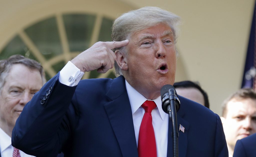 President Donald Trump gestures while answering questions from members of the media about Supreme Court nominee Judge Brett Kavanaugh in the Rose Garden of the White House in Washington, Monday, Oct. 1, 2018. (AP Photo/Pablo Martinez Monsivais)
