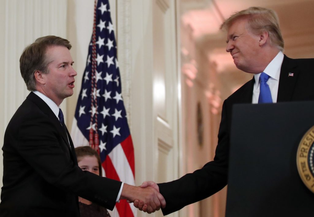 President Donald Trump shakes hands with Judge Brett Kavanaugh his Supreme Court nominee, in the East Room of the White House, Monday, July 9, 2018, in Washington.  (AP Photo/Alex Brandon)