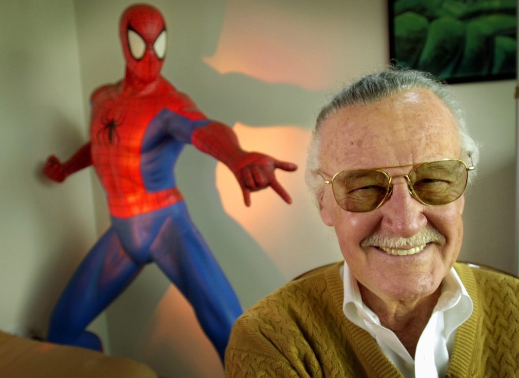 ** ADVANCE FOR WEEKEND EDITIONS, MAY 2-5 **Stan Lee, 79, creator of comic-book franchises such as "Spider-Man," "The Incredible Hulk" and "X-Men," smiles during a photo session April 16, 2002, in his office in Santa Monica, Calif. Lee, who has a minor role in the upcoming Sony Pictures film "Spider-Man," opening in May, has weathered financial trouble in recent years. Now, a new wave of filmmakers are turning to Lee's superheroes for big-budget adventure movies. (AP Photo/Reed Saxon)