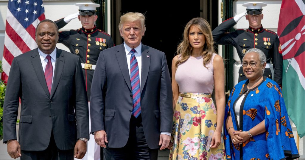 President Donald Trump and first lady Melania Trump pose for members of the media with Kenyan President Uhuru Kenyatta and his wife Margaret Kenyatta as they arrive at the White House, Monday, Aug. 27, 2018, in Washington. (AP Photo/Andrew Harnik)