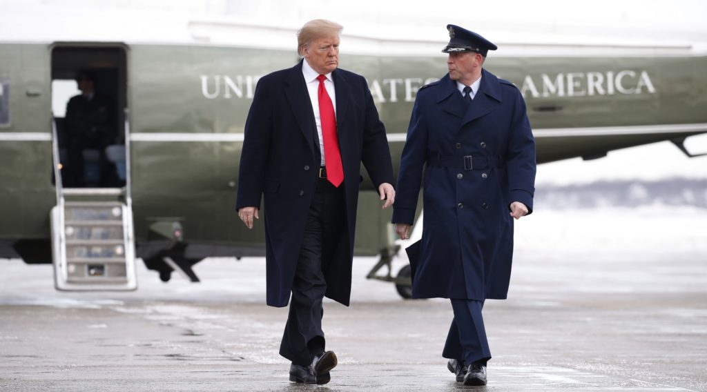 President Donald Trump walks to board Air Force One at Andrews Air Force Base, Md., Monday Jan. 14, 2019, en route to New Orleans. (AP Photo/Jacquelyn Martin)