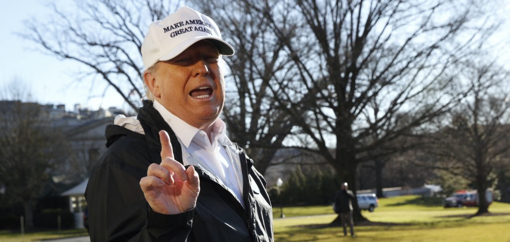 President Donald Trump gestures as a reporter asks a question, as he speaks to the media on the South Lawn of the White House, Thursday Jan. 10, 2019, in Washington, en route for a trip to the border in Texas as the government shutdown continues. (AP Photo/Jacquelyn Martin)