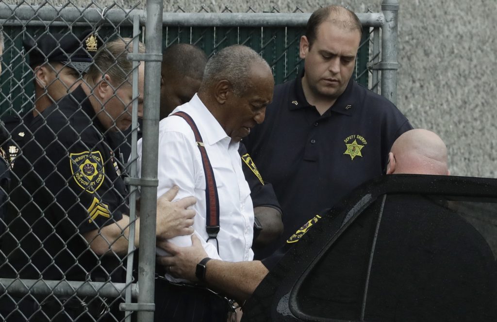 Bill Cosby departs after his sentencing hearing at the Montgomery County Courthouse, Tuesday, Sept. 25, 2018, in Norristown, Pa. Cosby left in handcuffs to begin serving a three-to-10 year prison sentence for sexual assault. (AP Photo/Matt Slocum)