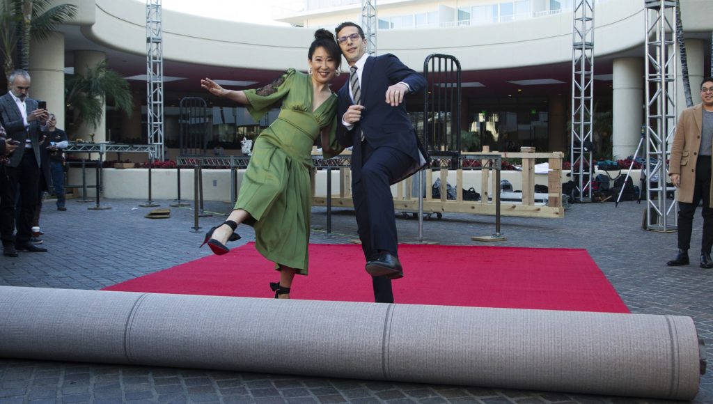 Sandra Oh, left, and Andy Samberg roll out the red carpet at the 76th Annual Golden Globe Awards Preview Day at The Beverly Hilton on Thursday, Jan. 3, 2019, in Beverly Hills, Calif. (Photo by Willy Sanjuan/Invision/AP)