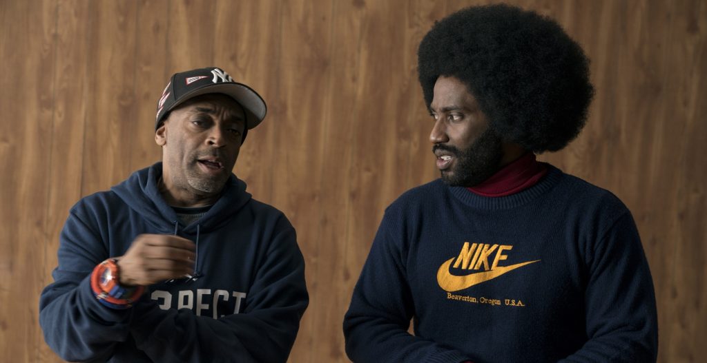 This image released by Focus features shows director Spike Lee, left, and actor John David Washington on the set of "BlacKkKlansma." Lee was nominated for an Oscar award for best director for his film, "BlacKkKlansman." The film was also nominated for best picture. (David Lee/Focus Features via AP)