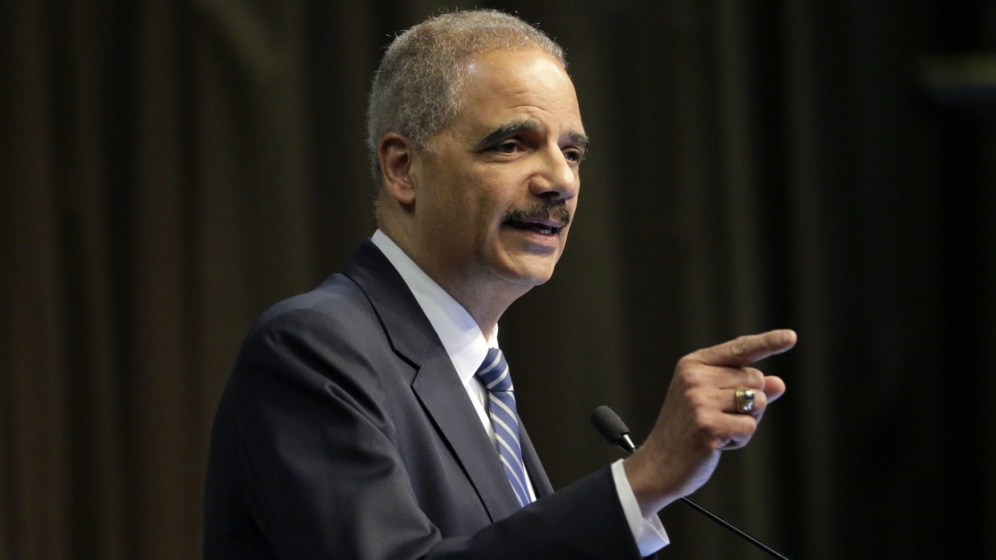Former U.S. Attorney General Eric Holder, Jr. speaks during the National Action Network Convention in New York, Wednesday, April 3, 2019. (AP Photo/Seth Wenig)