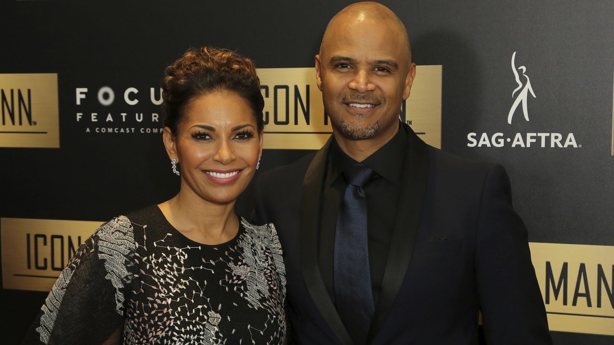 Salli Richardson-Whitfield, left, and Dondre Whitfield arrive at the 7th Annual ICON MANN Pre-Oscar Dinner at the Waldorf Astoria on Thursday, Feb. 21, 2019, in Beverly Hills, Calif. (Photo by Willy Sanjuan/Invision/AP)