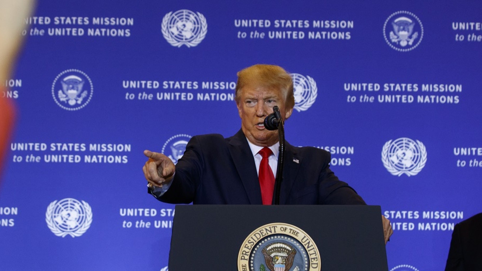 Secretary of State Mike Pompeo listens as President Donald Trump speaks during a news conference at the InterContinental Barclay New York hotel during the United Nations General Assembly, Wednesday, Sept. 25, 2019, in New York. (AP Photo/Evan Vucci)