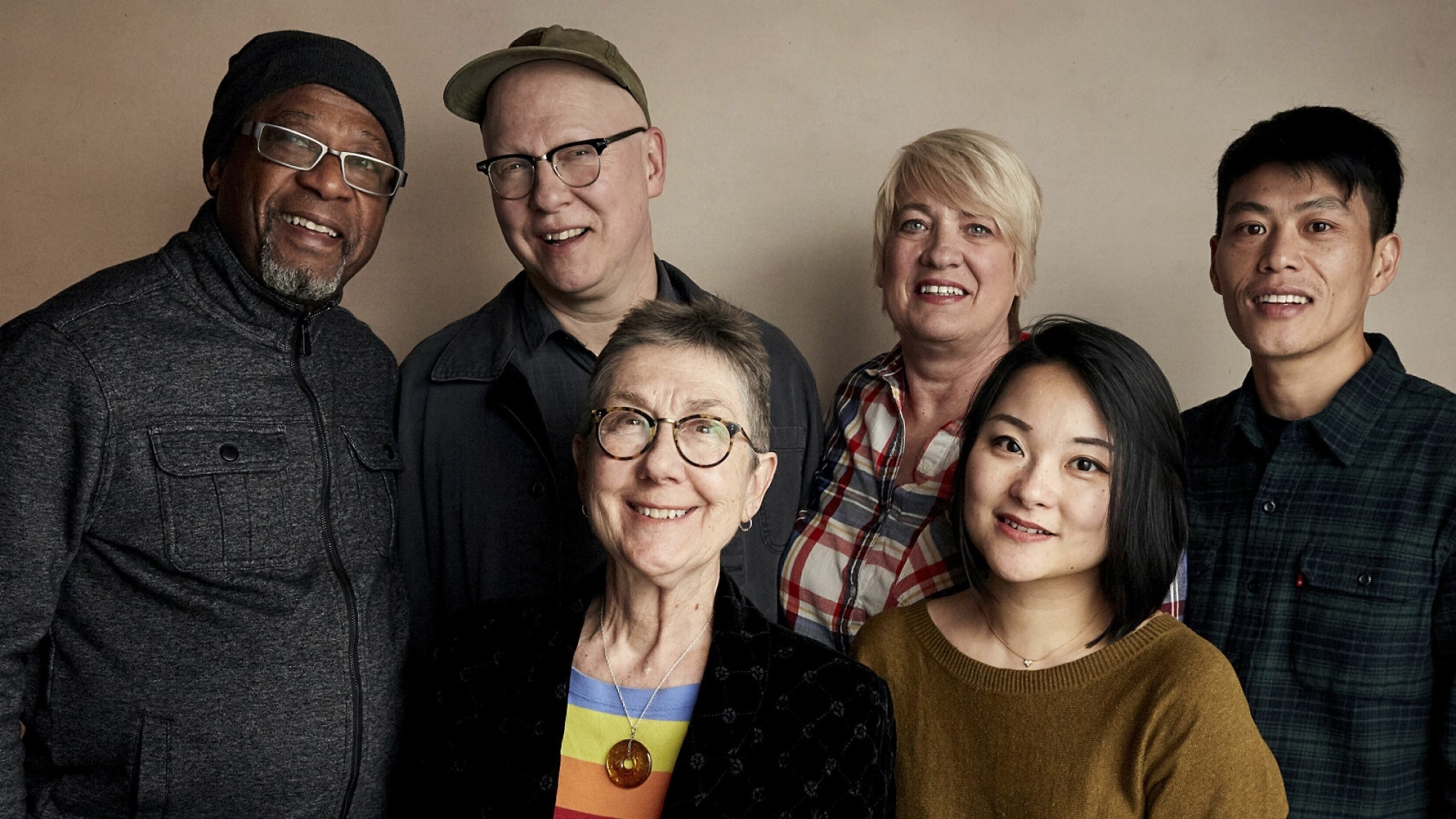 FILE - In this Saturday, Jan. 26, 2019 file photo, Bobby Allen, from top left, director Steven Bognar, Jill Lamantia, Wong He, director Julia Reichert, bottom left, and producer Yiqian Zhang pose for a portrait to promote the film "American Factory" at the Salesforce Music Lodge during the Sundance Film Festival, in Park City, Utah. The documentary about an Ohio auto glass factory that is run by a Chinese investor debuted Wednesday, Aug. 21, 2019, on Netflix, as the streaming service's first project backed by Michelle and Barack Obama's new production company. (Photo by Taylor Jewell/Invision/AP, File)