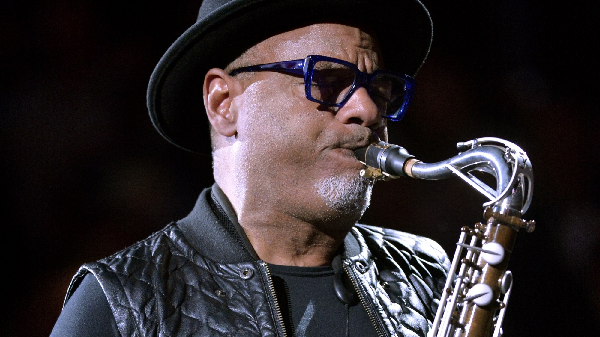 Kirk Whalum performs the National Anthem before an NBA basketball game between the Toronto Raptors and the Memphis Grizzlies Tuesday, Nov. 27, 2018, in Memphis, Tenn. (AP Photo/Brandon Dill)