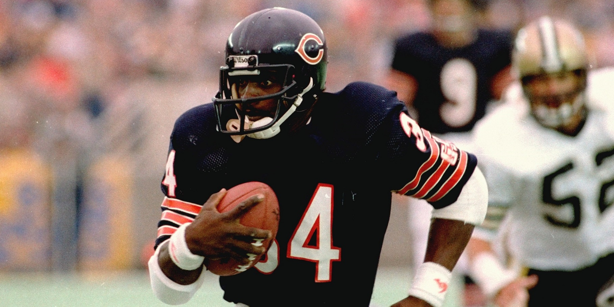 This is an October 8, 1984  photo of the Chicago Bears' Walter Payton in action looking for an opening during a game against the New Orleans Saints.  (AP Photo/ Fred Jewell)