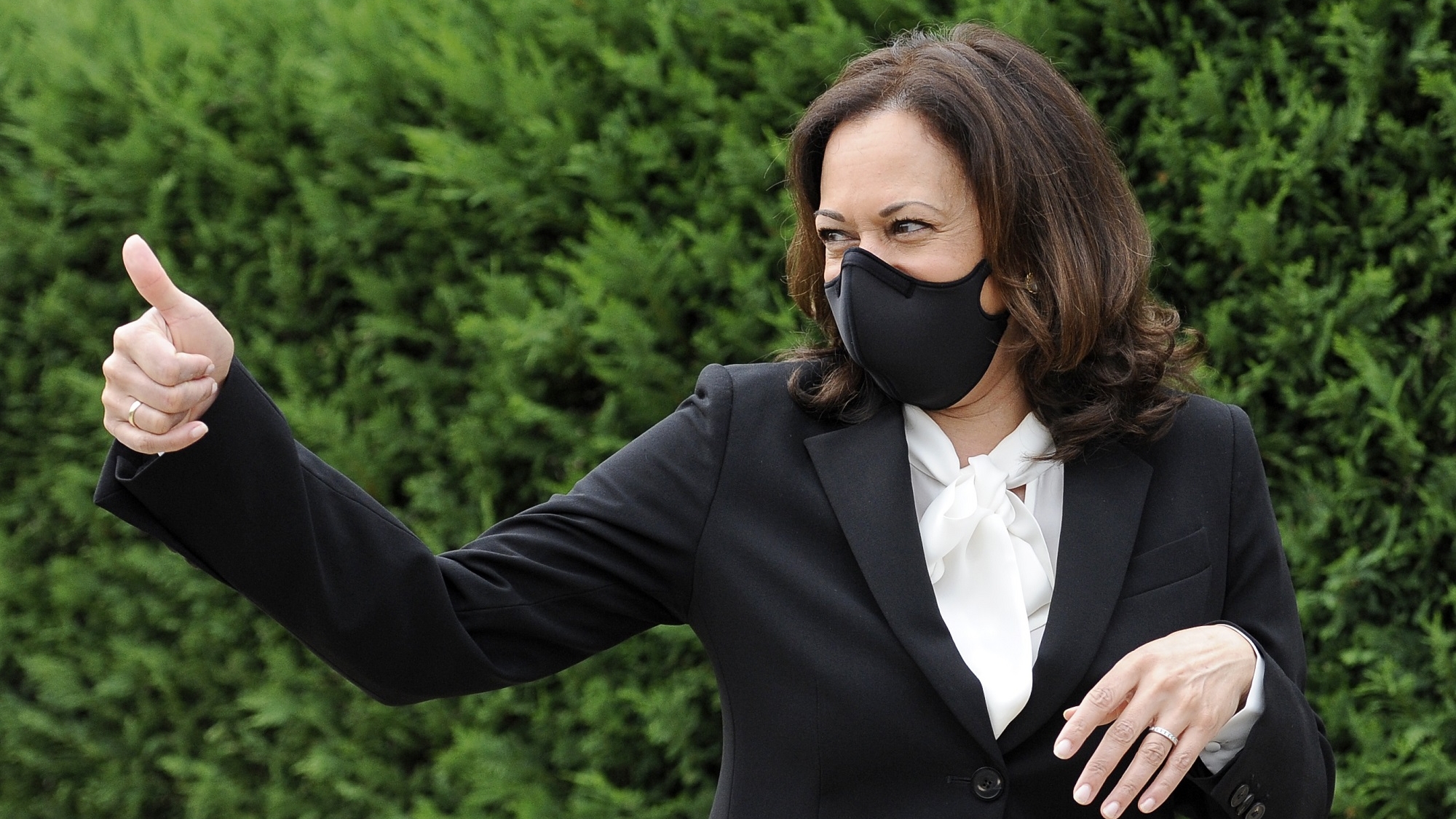 In this Sept. 17, 2020, photo, Democratic vice presidential candidate Sen. Kamala Harris, D-Calif., gives a thumps up during a campaign stop in Philadelphia. Black voters across Michigan will be pivotal in deciding who will win the battleground state in November. But engaging them at a time of immense uncertainty across the nation because of the pandemic and unrest over the effects of systemic racism has been especially challenging. (AP Photo/Michael Perez)