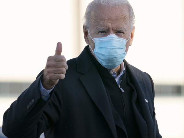 Democratic presidential candidate former Vice President Joe Biden gives the thumbs up as he boards his campaign plane at New Castle Airport in New Castle, Del., Tuesday, Nov. 3, 2020, en route to Scranton, Pa. (AP Photo/Carolyn Kaster)