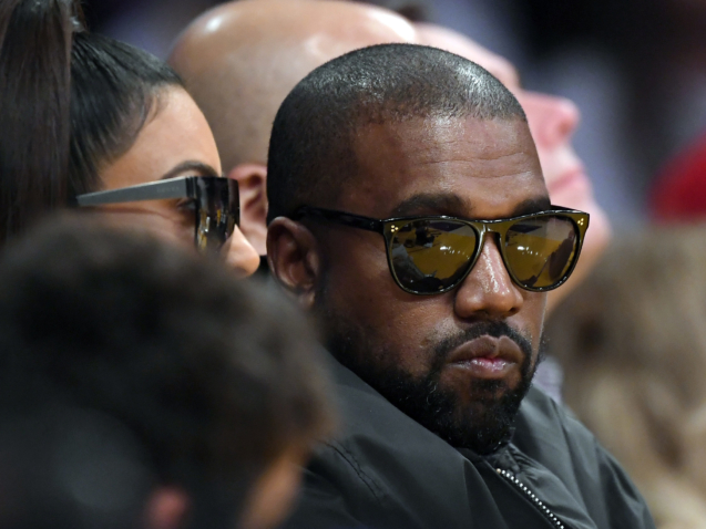 Kim Kardashian, left, and rapper Kanye West watch during the second half of an NBA basketball game between the Los Angeles Lakers and the Cleveland Cavaliers, Monday, Jan. 13, 2020, in Los Angeles. The Lakers won 128-99. (AP Photo/Mark J. Terrill)