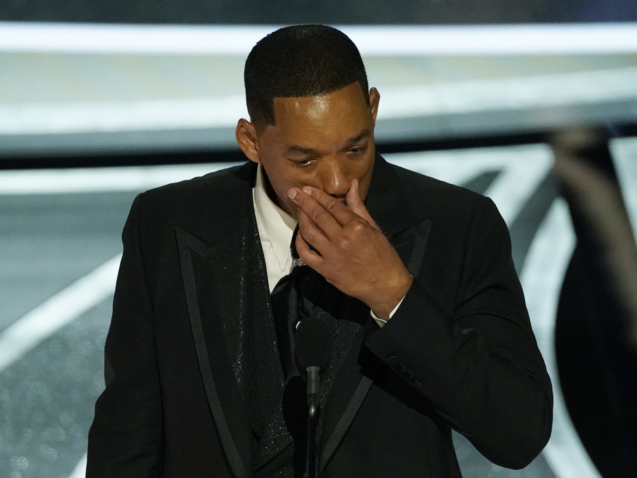 Will Smith wipes away tears during his acceptance speech for Best Actor at the Oscars, Sunday, March 27, 2022, at the Dolby Theatre in Los Angeles. (AP Photo/Chris Pizzello)