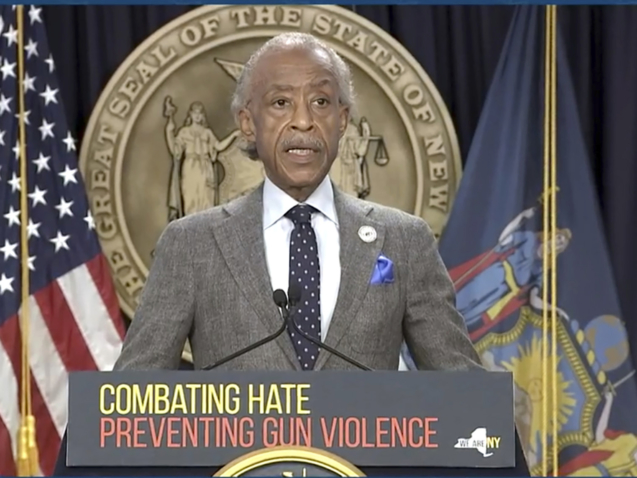 In this image taken from video, Rev. Al Sharpton speaks during a news conference by Gov. Kathy Hochul, Wednesday, May 18, 2022, in New York.  New York would require state police to seek court orders to keep guns away from people who might pose a threat to themselves or others under a package of executive orders and gun control bills touted Wednesday by Hochul in the aftermath of a racist attack on a Buffalo supermarket.  (Office of the Governor of New York via AP)