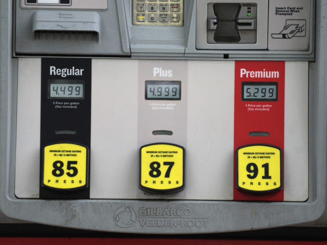 The prices are dispalyed above the various grades of gasoline available at a Conoco station Saturday, May 21, 2022, in Denver. (AP Photo/David Zalubowski)
