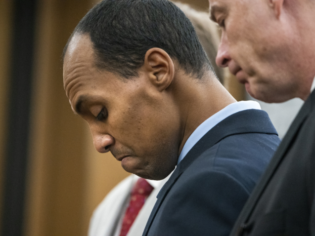 FILE - In this Friday, June 7, 2019, file photo, former Minneapolis police Officer Mohamed Noor reads a statement in Minneapolis, before being sentenced by Judge Kathryn Quaintance in the fatal shooting of Justine Ruszczyk Damond. New rules on electronic coverage of criminal sentencings in Minnesota are pulling back the curtain on what happens in court. The sentencing of Noor for killing a 911 caller was among several recent high-profile cases that cameras were allowed to record. (Leila Navidi/Star Tribune via AP, Pool, File)