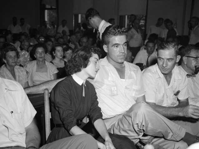 FiLE - In this Sept. 22. 1955 photo, Carolyn Bryant rests her head on her husband Roy Bryant's shoulder after she testified in Emmett Till murder court case in Sumner, Miss. A team searching the basement of a Mississippi courthouse for evidence about the lynching of Black teenager Emmett Till has found the unserved warrant charging a white woman in his kidnapping in 1955, and relatives of the victim want authorities to finally arrest her nearly 70 years later. A warrant for the arrest of Carolyn Bryant Donham _ identified as “Mrs. Roy Bryant” on the document _ was discovered last week by searchers inside a file folder that had been placed in a box, Leflore County Circuit Clerk Elmus Stockstill told The Associated Press on Wednesday, June 29, 2022. (AP Photo, File)