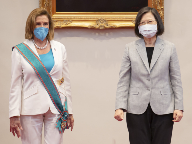 In this photo released by the Taiwan Presidential Office, U.S. House Speaker Nancy Pelosi, left, and Taiwanese President President Tsai Ing-wen stand during a meeting in Taipei, Taiwan, Wednesday, Aug. 3, 2022. U.S. House Speaker Nancy Pelosi, meeting top officials in Taiwan despite warnings from China, said Wednesday that she and other congressional leaders in a visiting delegation are showing they will not abandon their commitment to the self-governing island. (Taiwan Presidential Office via AP)