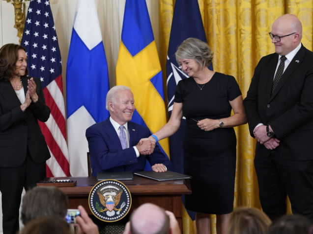 President Joe Biden shakes hands with Karin Olofsdotter, Sweden's ambassador to the U.S., after signing the Instruments of Ratification for the Accession Protocols to the North Atlantic Treaty for the Kingdom of Sweden in the East Room of the White House in Washington, Tuesday, Aug. 9, 2022. From left, Vice President Kamala Harris, Biden, Olofsdotter and Mikko Hautala, Finland's ambassador to the U.S. (AP Photo/Susan Walsh)