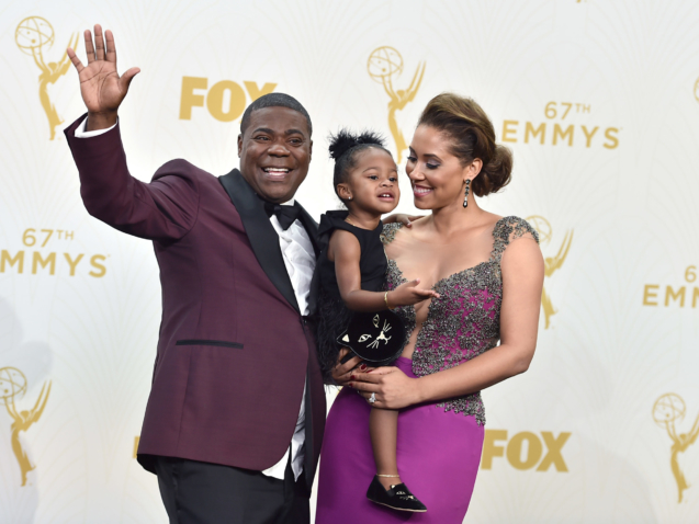 Tracy Morgan, from left, Maven Sonae Morgan, and Megan Wollover pose in the press room at the 67th Primetime Emmy Awards on Sunday, Sept. 20, 2015, at the Microsoft Theater in Los Angeles. (Photo by Jordan Strauss/Invision/AP)