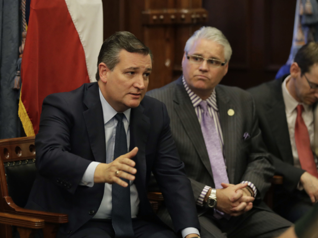 Sen. Ted Cruz, R-Texas, left, speaks during a roundtable discussion hosted by Texas Gov. Gregg Abbott to address safety and security at Texas schools in the wake of the shooting at Santa Fe, in Austin, Texas, Thursday, May 24, 2018. Thursday's roundtable included victims, students, families and educators from the Santa Fe, Alpine and Sutherland Springs communities. (AP Photo/Eric Gay)