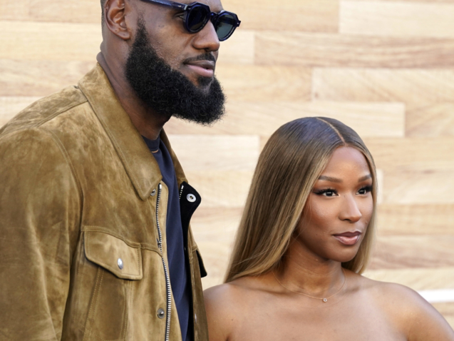 LeBron James and his wife Savannah pose together at the premiere of the film "Hustle," Wednesday, June 1, 2022, at the Regency Village Theatre in Los Angeles. (AP Photo/Chris Pizzello)
