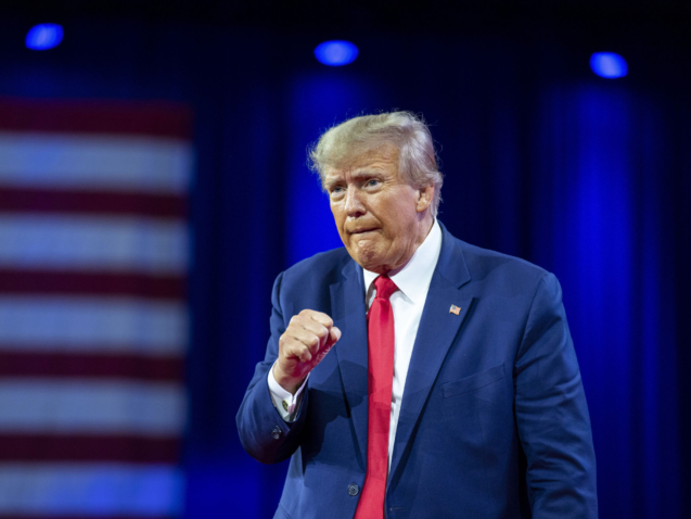 FILE - Former President Donald Trump pumps his fist after speaking at the Conservative Political Action Conference, March 4, 2023, Oxon Hill, Md. The Manhattan district attorney's office appears to be getting close to a decision on whether to charge Donald Trump over hush-money payments to Stormy Daniels during his 2016 presidential campaign. (AP Photo/Alex Brandon, File)
