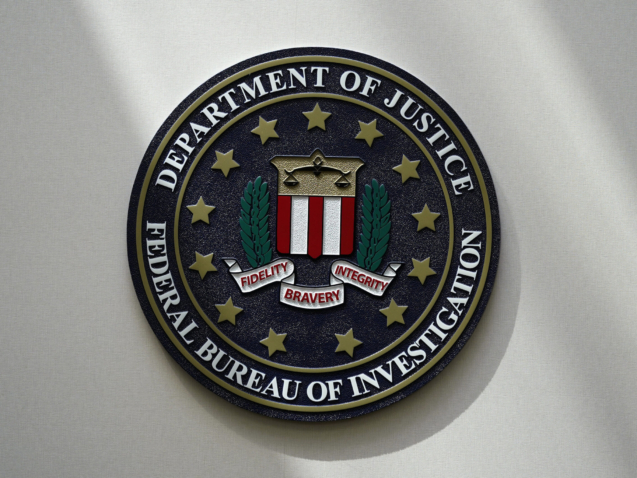 FILE - The FBI seal is pictured in Omaha, Neb., Aug. 10, 2022. The number of hate crimes in the U.S. jumped again in 2021, continuing an alarming rise, according to FBI data released Monday, March 13, 2023. Most victims were targeted due to race or ethnicity, followed by sexual orientation and religion. (AP Photo/Charlie Neibergall, File)
