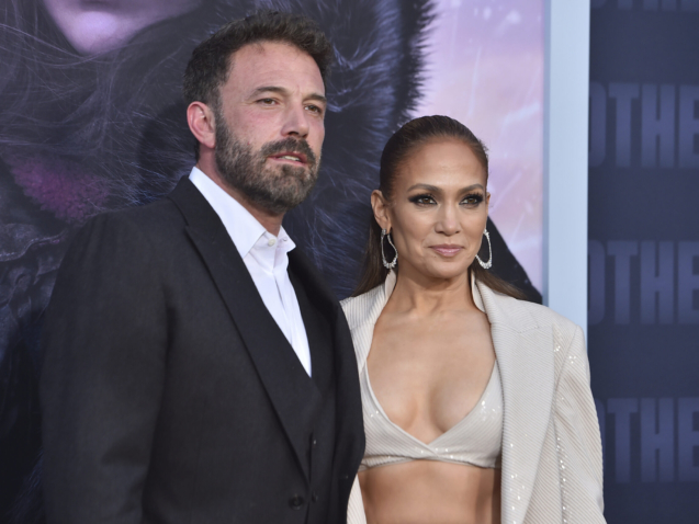 Ben Affleck, left, and Jennifer Lopez arrive at the Los Angeles premiere of "The Mother," Wednesday, May 10, 2023, at Westwood Regency Village Theater . (Photo by Jordan Strauss/Invision/AP)