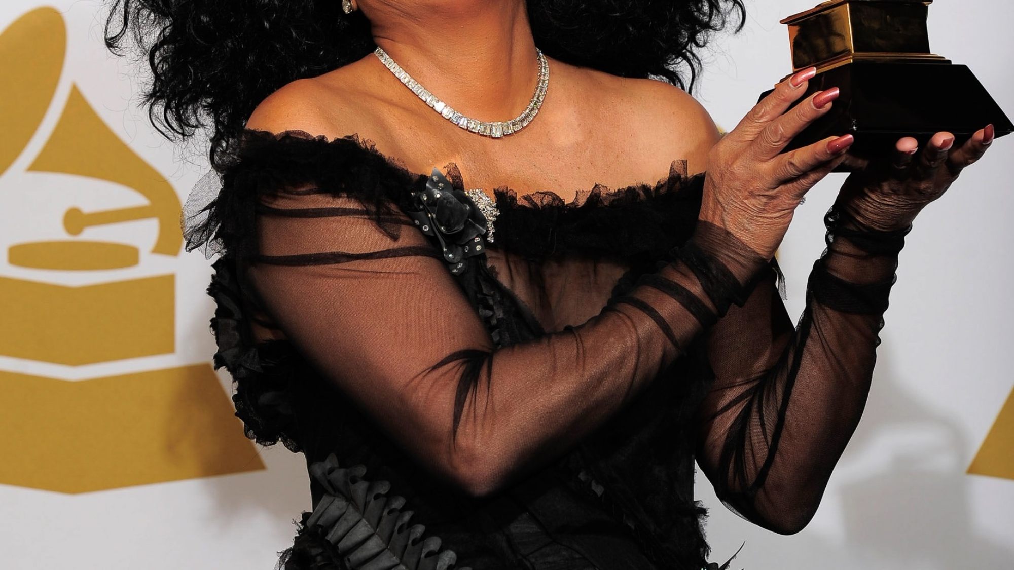 Diana Ross poses backstage with her Lifetime Achievement award at the 54th annual Grammy Awards on Sunday, Feb. 12, 2012 in Los Angeles. (AP Photo/Mark J. Terrill)