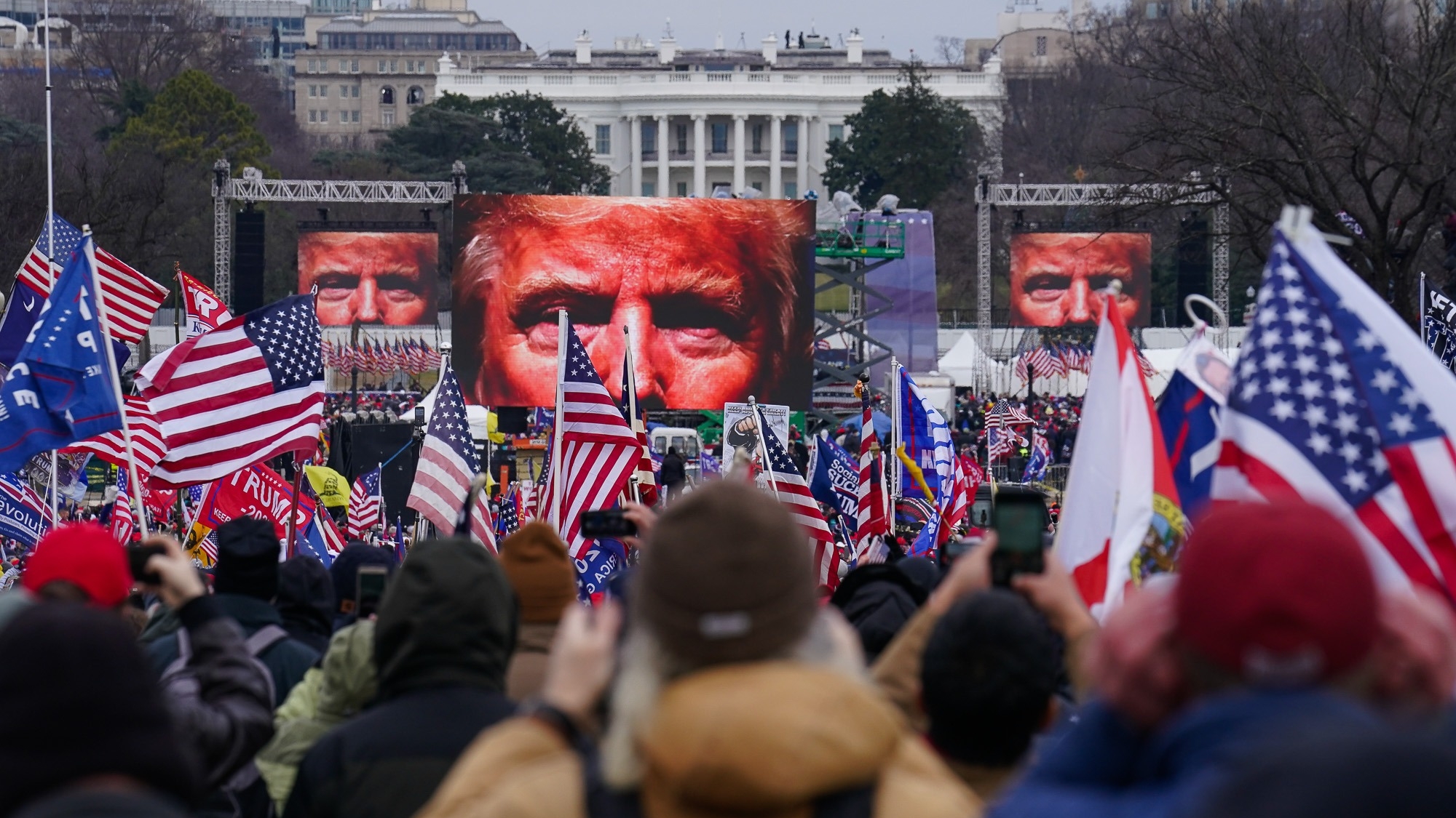 FILE - Supporters of Donald Trump participate in a rally in Washington, Jan. 6, 2021. The Supreme Court is hearing arguments Tuesday, April 16, 2024, over the charge of obstruction of an official proceeding that has been brought against 330 people, according to the Justice Department. The charge refers to the disruption of Congress' certification of Joe Biden's 2020 presidential election victory over former President Trump. Trump faces two obstruction charges. Next week, the justices will weigh whether Trump can be prosecuted at all for his efforts to overturn the 2020 election results. (AP Photo/John Minchillo, File)