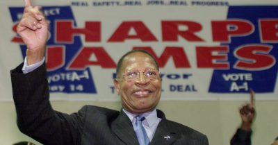 Newark Mayor Sharpe James celebrates at his election night headquarters after an electoral victory