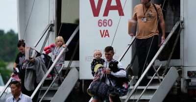 Afrikaner refugees from South Africa arrive at Dulles International Airport.